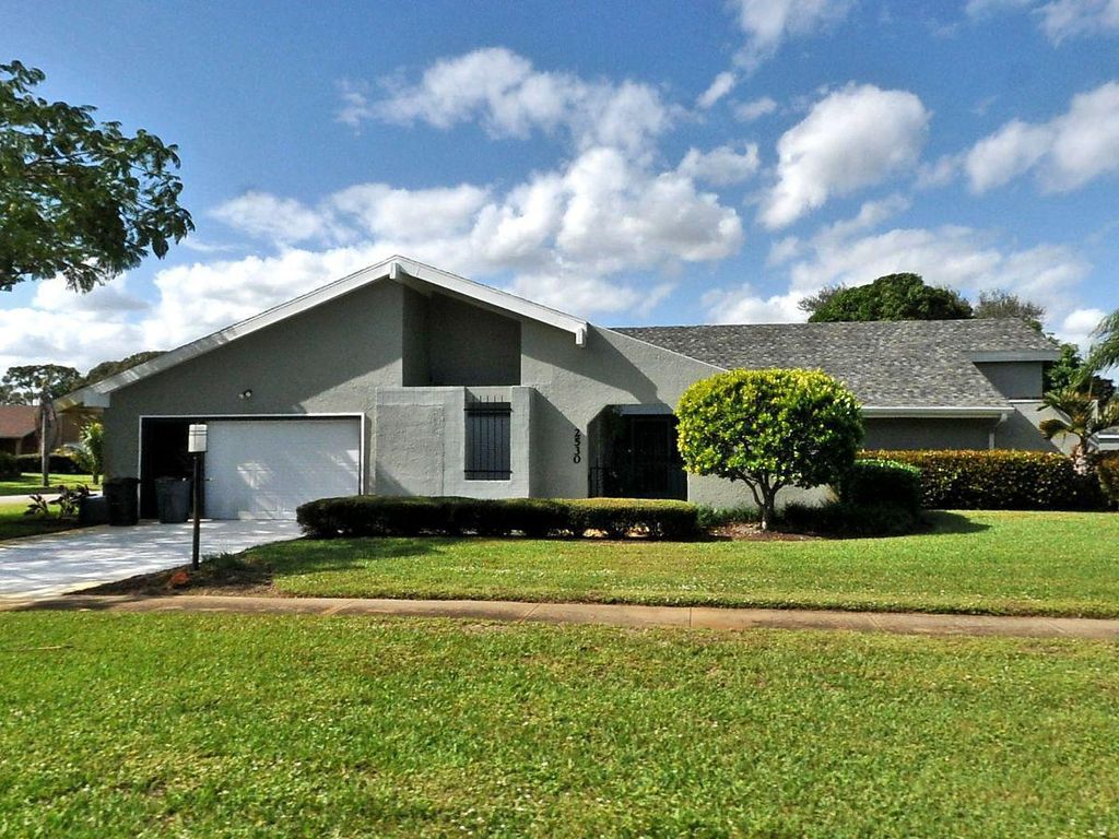 Photo of 2530 SE Gowin Drive, Port Saint Lucie, FL 34952 (MLS # R10988963)