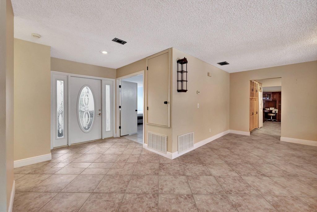 Photo of 2530 SE Gowin Drive, Port Saint Lucie, FL 34952 (MLS # R10988963)