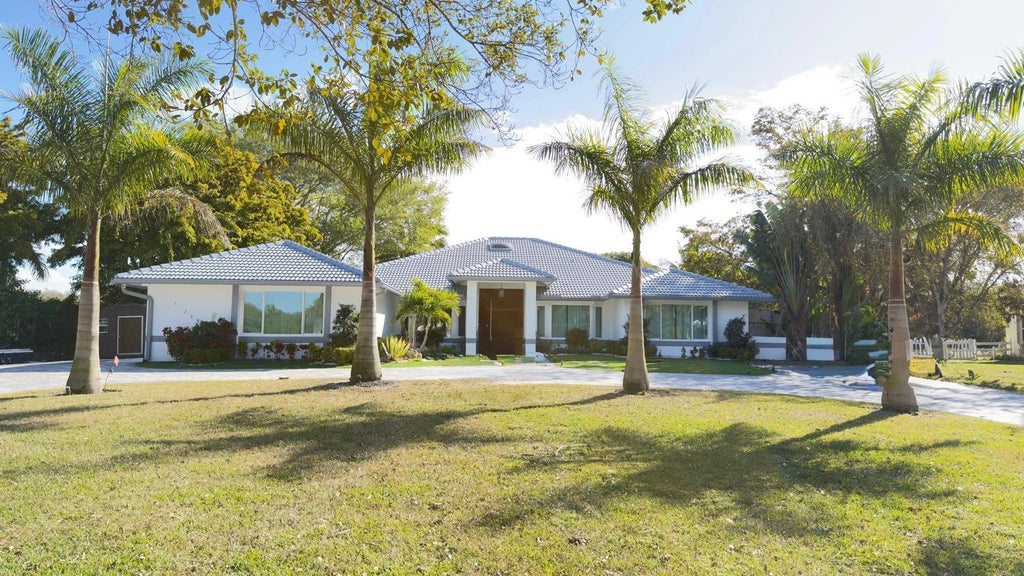 Photo of 5928 NW 77TH Terrace, Parkland, FL 33067 (MLS # B26076756)