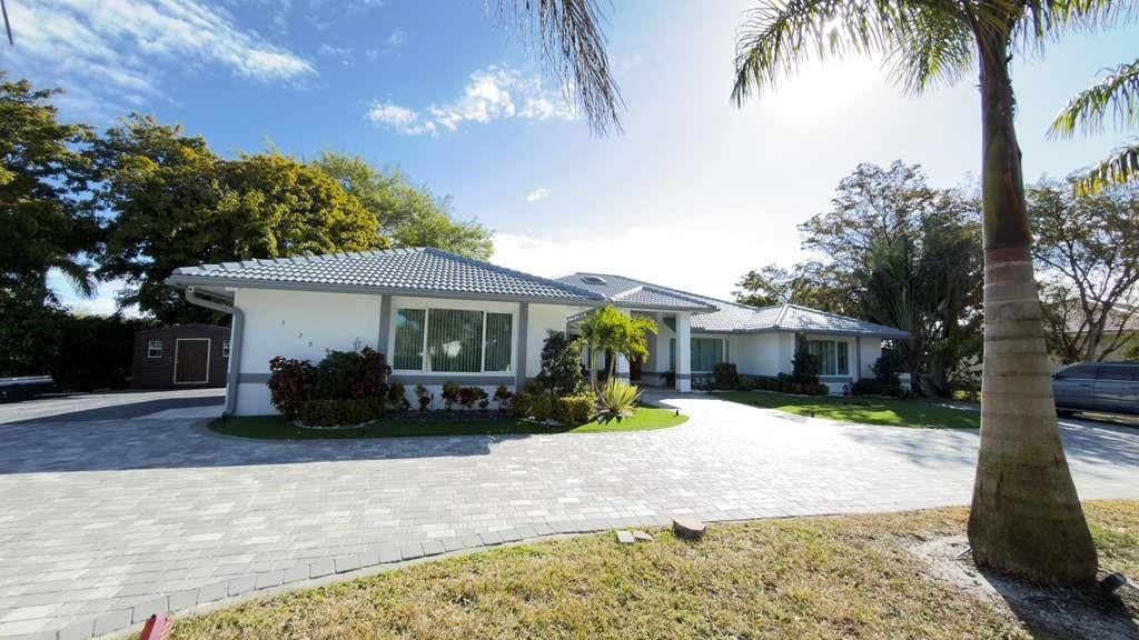 Photo of 5928 NW 77TH Terrace, Parkland, FL 33067 (MLS # B26076756)