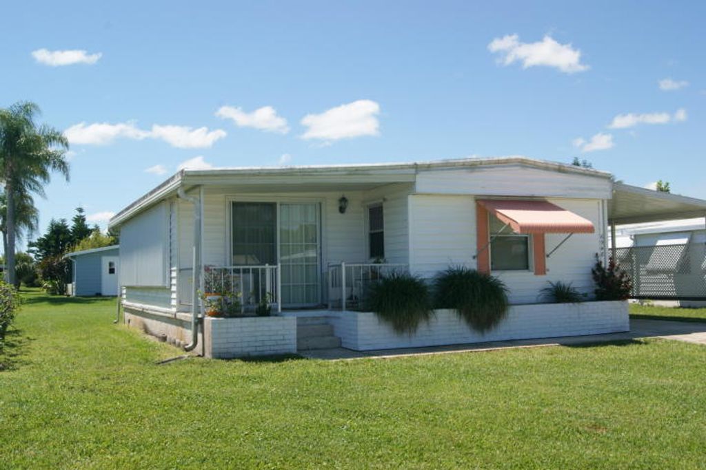 Photo of 6948 SE Delegate Street, Hobe Sound, FL 33455 (MLS # R11143516)