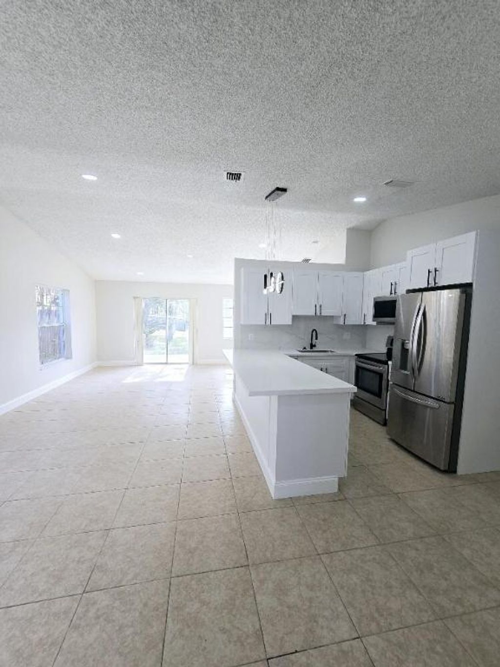Photo of 5450 Pinnacle Lane, West Palm Beach, FL 33415 (MLS # R11044114)