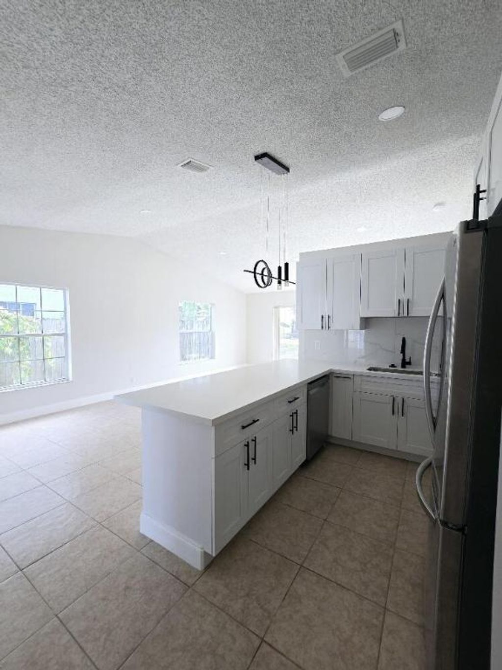 Photo of 5450 Pinnacle Lane, West Palm Beach, FL 33415 (MLS # R11044114)