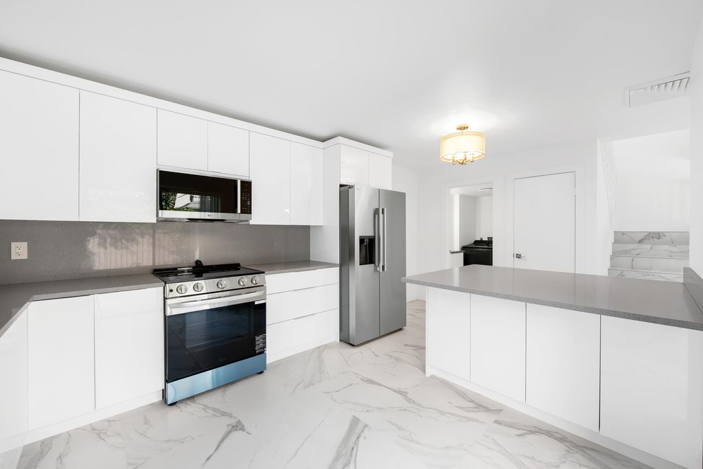 Photo of 2962 SW 12th Street, Deerfield Beach, FL 33442 (MLS # B26028803)