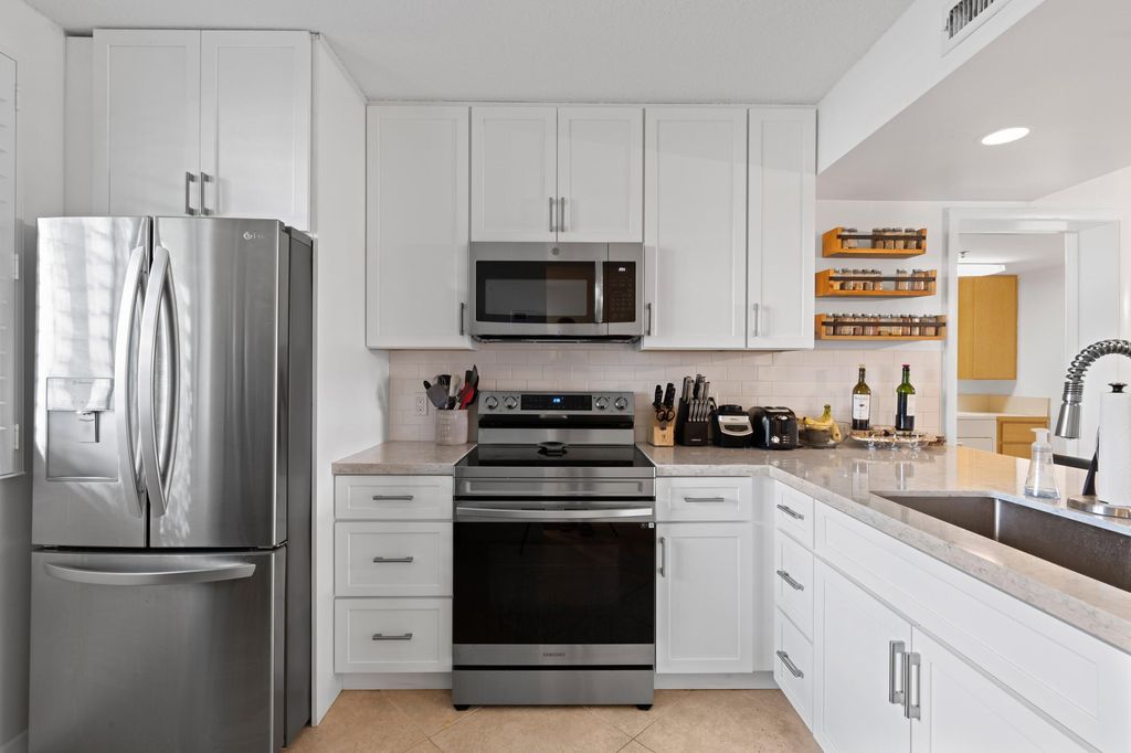 Photo of 101 S Seas Drive #102, Jupiter, FL 33477 (MLS # R10866387)