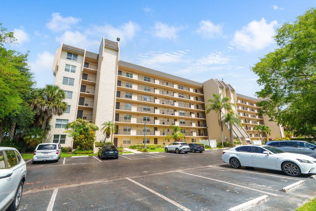 Photo of 3300 W Rolling Hills Cir #704, Davie, FL 33328 (MLS # F10524191)