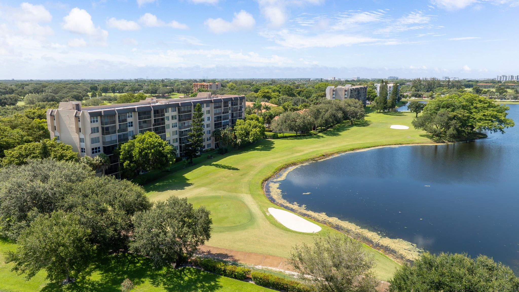 Welcome to elevated living ~ literally. This 2-bedroom, 2-bathroom East facing condo with an extra large, screened balcony sits on the top (7th) floor, offering scenic, unobstructed views of the lush Grande Oaks Golf Club, owned by Nova Southeastern University & home to the NSU Sharks golf teams. You'll enjoy colorful sunrises with your morning coffee. Inside, the kitchen is open with a snack bar area leading to the dining/living area. The space is well laid out & flows well. This unit has an extra wide floorplan. It's ready for your personal touch or it's perfectly fine like it is. This condo is being shared with you by the original owners who have made countless wonderful memories here! Close to NSU, Broward College, FAU, Hard Rock Casino, Fort Lauderdale Airport & most major highways.
