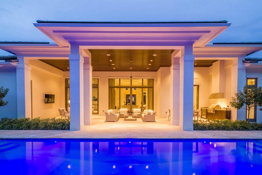 This is truly one of the most spectacular Grand Estates in Old Palm Golf Club. No detail was overlooked in the design and construction of this spacious single story residence. This Windsor model features a gracious great room, open floor plan for entertaining. Gorgeous outdoor living spaces offer a perfect respite at the end of the day.  This beautiful home features 4 bedrooms, 5 and a half baths, 3 car garage, and over 5000 square feet of air conditioned living space. Some of the finest touches include cr