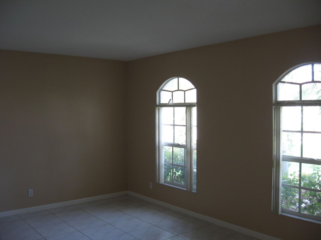 Photo of 5811 NW Rose Petal Court, Port Saint Lucie, FL 34986 (MLS # R10793987)