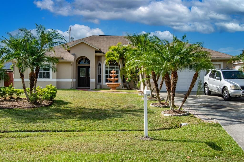 Photo of 1742 SW Comfort Street, Port Saint Lucie, FL 34987 (MLS # R10702322)