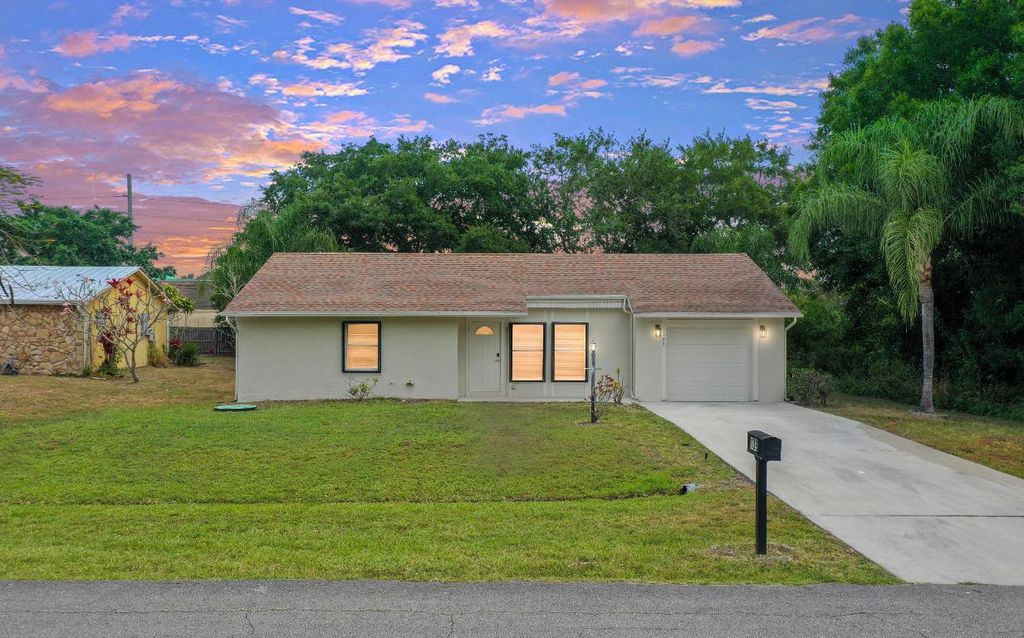 Photo of 109 SW Essex Drive, Port Saint Lucie, FL 34984 (MLS # R10978664)