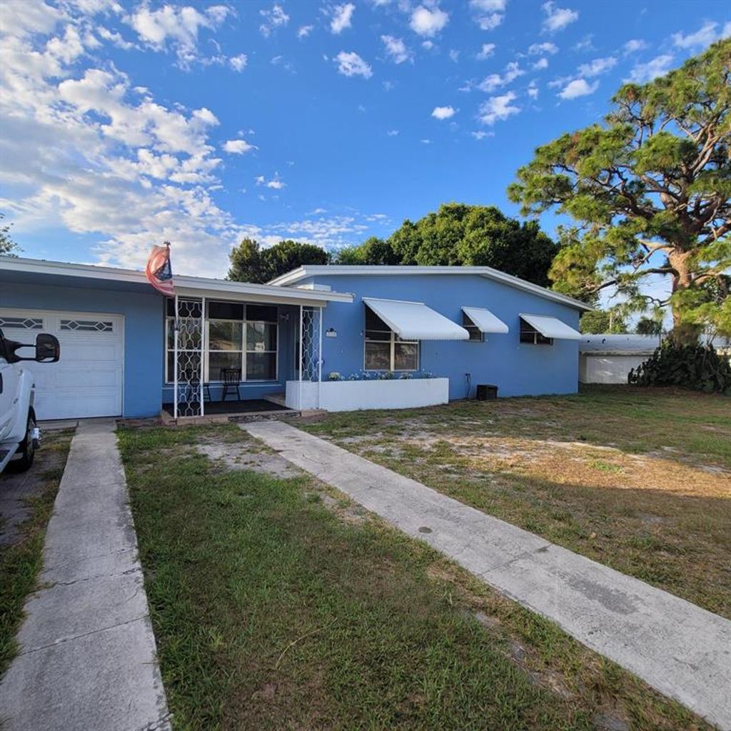 Photo of 225 NE Prima Vista Boulevard Blvd, Port St Lucie, FL 34983 (MLS # R10715590)