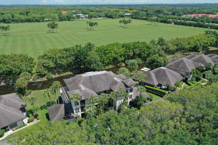 Spend the season in this beautiful penthouse on Polo Island in Palm Beach Polo & Country Club. Easy access with the elevator to this condo that covers the entire third (top) floor of the building with private balconies off each one of the four bedrooms. Each bedroom comes with an updated ensuite bathroom and the bedrooms are located on each corner of the unit, providing privacy for everyone. Completely updated throughout with impact glass windows and sliders. Relax and enjoy the peaceful water views and gorgeous mature trees. Private laundry and two covered parking spaces. Polo Island condos also have their own community pool. DISCLAIMER: All information provided to you regarding this Property by realtor and her associates has been obtained from third parties such as the  Multiple Listing Service public records and other sources. All Tenants should independently verify all information provided regarding this Property. The Landlord, realtor and broker make no representation as to the accuracy of this information. All Tenants should perform their own independent due diligence regarding this Property before executing a Lease for the Property.