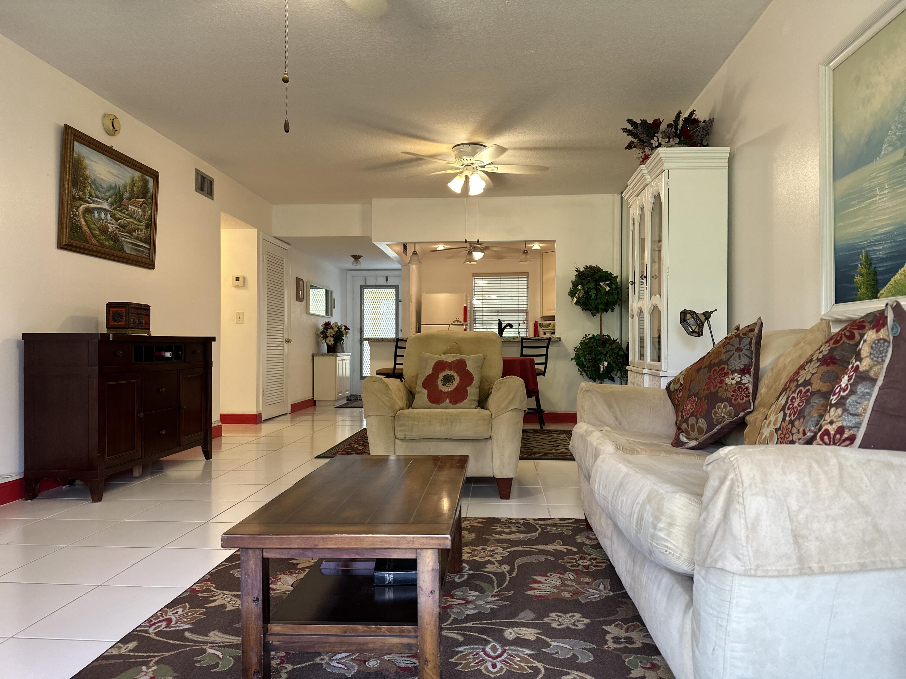 Your new paradise in sunny Florida. Well maintain building, recently painted, new roof, and LOW Condo fee. Open kitchen, 2 bedrooms 2 baths, Impact windows, corner unit , tile floor. and special condo finance. Centrally located and Walking distance to supermarket, restaurants, shopping.