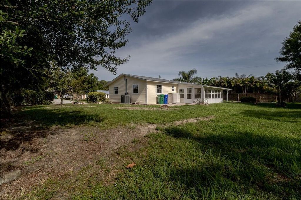 Photo of 874 Blossom Dr, Sebastian, FL 32958 (MLS # B26017033)