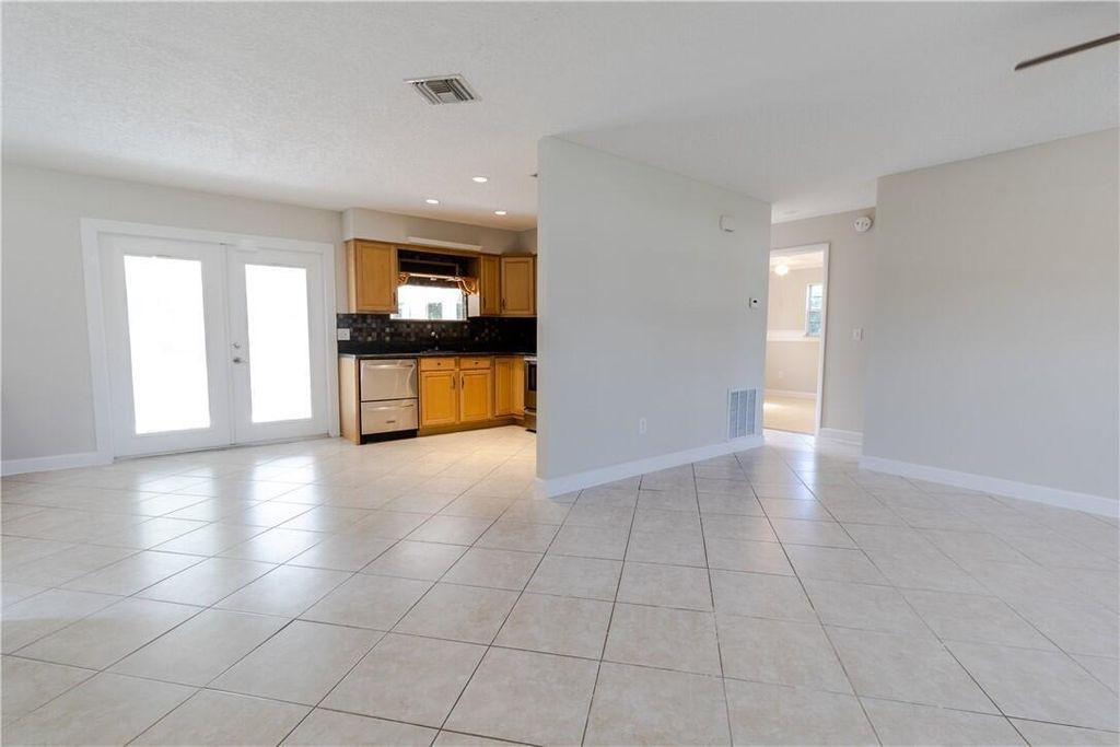 Photo of 874 Blossom Dr, Sebastian, FL 32958 (MLS # B26017033)