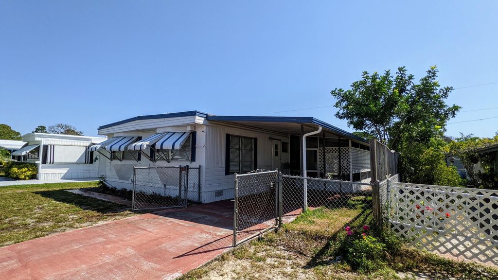 Photo of 7985 SE Wren Avenue, Hobe Sound, FL 33455 (MLS # R10797806)