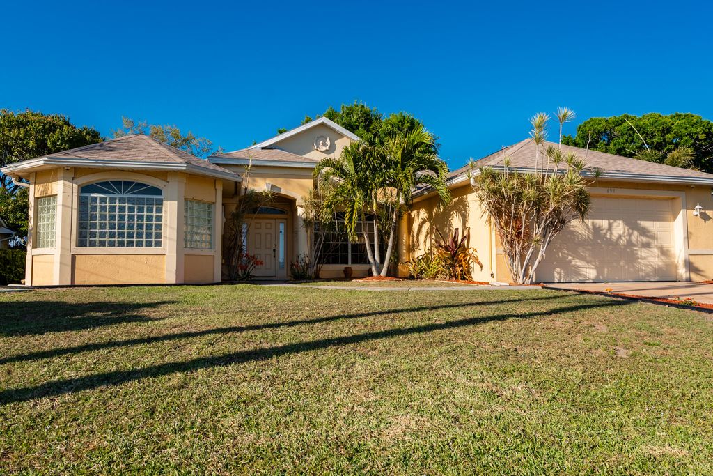 Photo of 691 SW Estate Avenue, Port Saint Lucie, FL 34953 (MLS # R11063048)