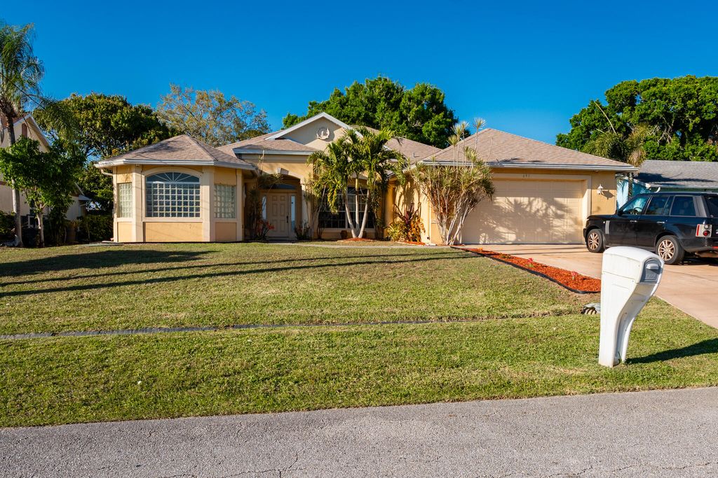 Photo of 691 SW Estate Avenue, Port Saint Lucie, FL 34953 (MLS # R11063048)