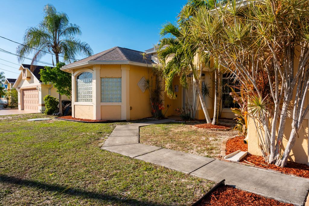 Photo of 691 SW Estate Avenue, Port Saint Lucie, FL 34953 (MLS # R11063048)