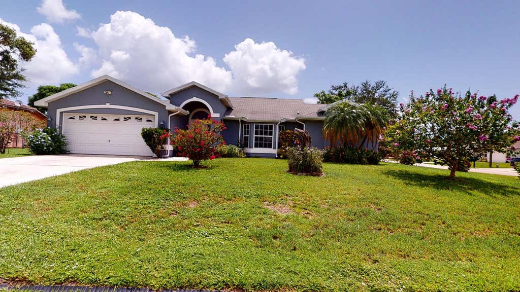 Photo of 101 SW Covington Road, Port St Lucie, FL 34953 (MLS # R10894087)