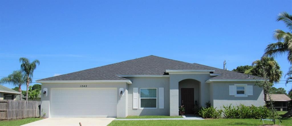Photo of 1245 SW Malaga Avenue, Port Saint Lucie, FL 34953 (MLS # R10739832)
