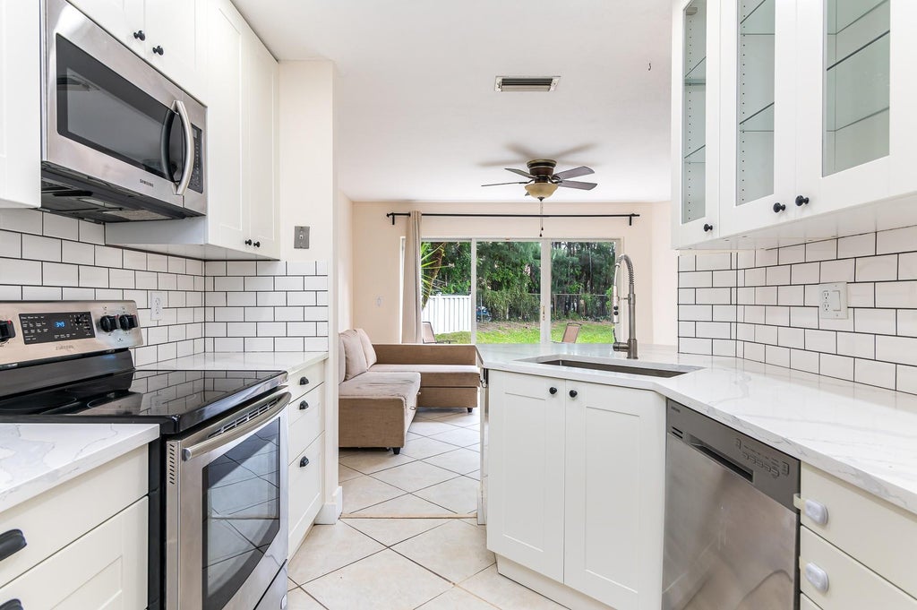 Photo of 2916 NW 99th Terrace, Sunrise, FL 33322 (MLS # B26089646)