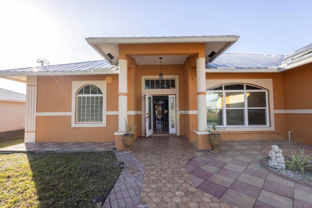 Photo of 4074 SW Kallen Street, Port Saint Lucie, FL 34953 (MLS # B26030741)