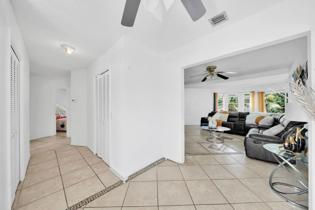 Photo of 213 SE Eyerly Avenue, Port Saint Lucie, FL 34983 (MLS # R11157918)