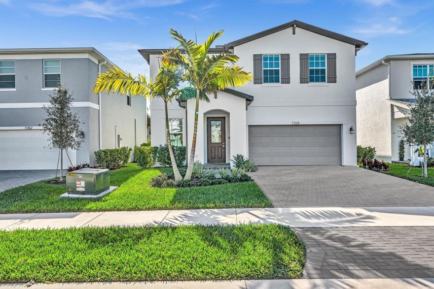 Immediate Occupancy. Built in 2025. Seller relocation forces sale. This Hazel Model has a large (24'x9') covered lanai overlooking a premium extended lot offering space and privacy. Upgraded cabinetry in kitchen and baths plus attractive quartz countertops. Comes with light fixture, fans, window treatments and more. Stunning tile floor throughout 1st floor plus a convenient powder room. Upstairs there are 4 bedrooms and 2 nicely baths. Come see!