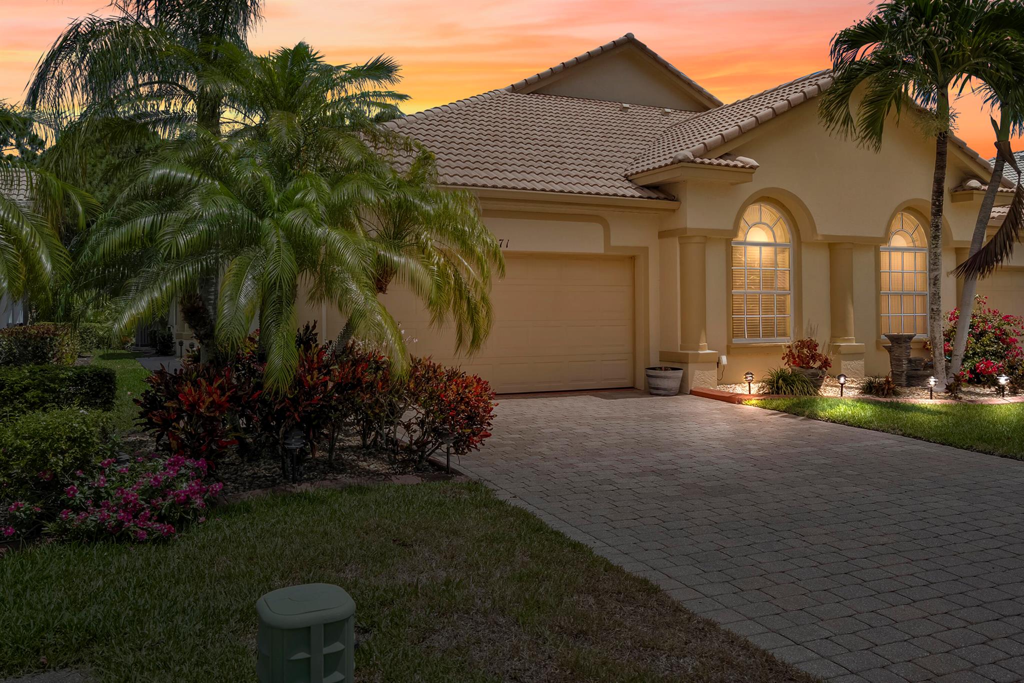 This beautifully maintained 3-bedroom, 2-bath villa with a 2-car garage is nestled in the highly sought-after, gated community of Jensen Beach County Club. Featuring a spacious split floor plan and tile flooring throughout, this home offers both comfort and style. The gourmet kitchen boasts granite countertops, a breakfast bar, and ample maple cabinetry perfect for entertaining. The primary suite has a walk-in closet, and the master bath has a garden tub and his/her vanities. Step outside with your morning coffee to an extended screened-in lanai that overlooks a lush, private preserve. Enjoy resort-style living with access to an array of community amenities, tennis/pickleball courts, three swimming pools, and the popular Links Restaurant. You also have a beautiful 18-hole championship