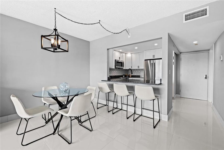 COMPLETE RENOVATION!!! Contemporary & Bright, 2BD/2BA corner unit condo w/STUNNING Point Canal & Downtown city views!!! NEW IMPACT WINDOWS & DOORS, New electrical panel, new AC, new kitchen w/appliances, new Bathrooms. Welcome to the exclusive gated island oasis of River Reach—a boater’s paradise w/more than 3,000 ft of open access dockage and no fixed bridges! Amenities include gated entry, 24-hour security, 3 heated pools, 2 tennis courts, exercise room, bike & kayak storage & affordable dockage up to 50 ft (check availability). Major Maintenance Project underway! New balcony railings & all community common areas updated (inc. pools, clubhouse, gate, landscaping, etc.). WASHER & DRYER HOOK UP INSIDE UNIT!!! Pet friendly. Close to Downtown, Las Olas Blvd, FLL airport, shops & restaurants.