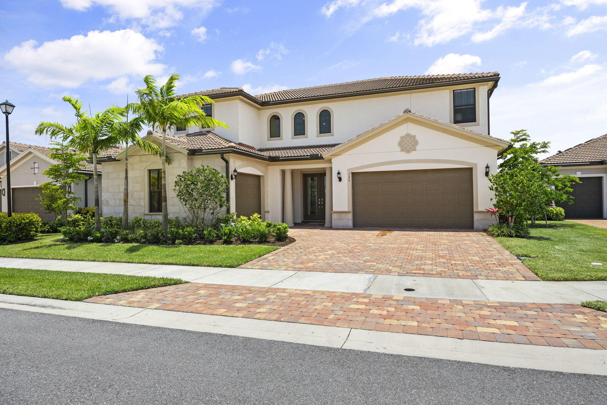 If you have been searching for a newer construction single family home with a beautiful outdoor space in an esteemed gated community, this is it! Come visit this home in the highly sought after gated community of Sonoma Isles in Jupiter. Sit by the pool and enjoy the gentle waterfall, the wide lake view and beautiful fountain lake. The home boasts a grand entrance with winding staircase, soaring ceilings, loads of light throughout, an open floor plan, oversized first-floor primary bedroom with a sitting area, and tons of upgrades. When touring the home, check out the attention to detail throughout. It's sunny and spacious and ideal for a family who will enjoy all this home and community has to offer. On the grounds you'll find tennis, pickleball, pool and playground and a clubhouse