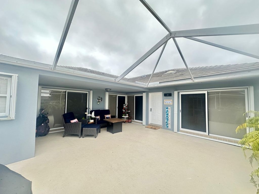 Photo of 1228 NW Sun Terrace Cir #D, Port Saint Lucie, FL 34986 (MLS # B26023680)