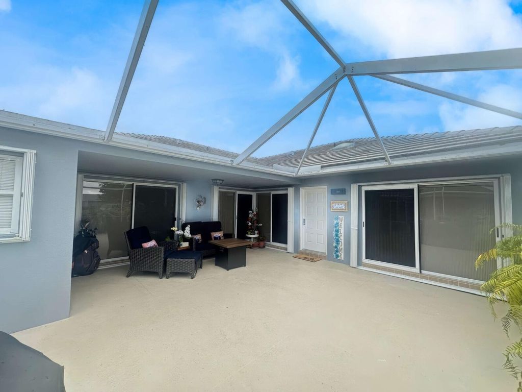 Photo of 1228 NW Sun Terrace Cir #D, Port Saint Lucie, FL 34986 (MLS # B26023680)