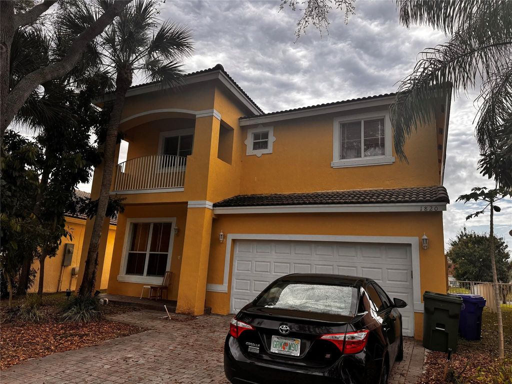 Photo of 1820 NW 78th Avenue, Pembroke Pines, FL 33024 (MLS # B26014373)