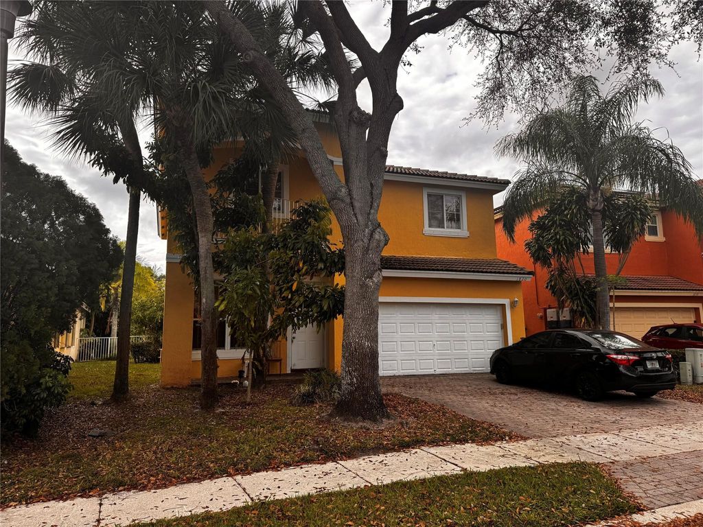 Photo of 1820 NW 78th Avenue, Pembroke Pines, FL 33024 (MLS # B26014373)