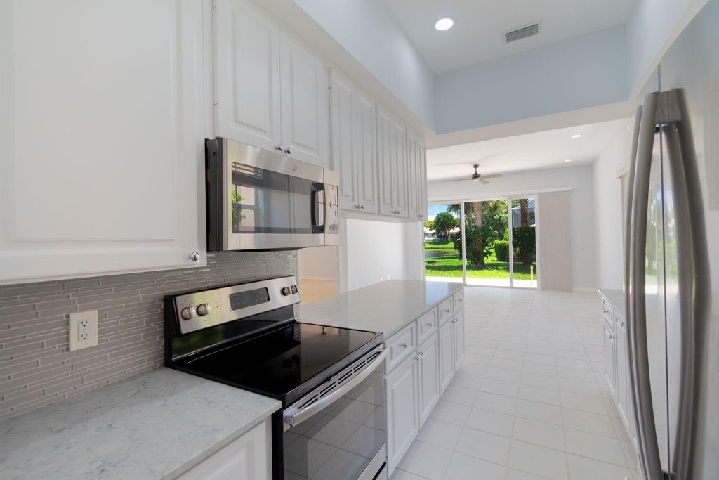 Photo of 4786 Blossom Drive, Delray Beach, FL 33445 (MLS # R11110415)