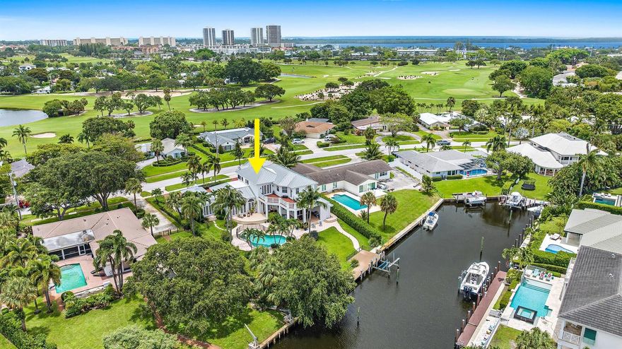 YACHT DOCKAGE in the Desirable Village of North Palm Beach! This 'Key West meets Palm Beach' home beautifully blends luxury + comfort. Located on a prime deep water lot in the Village this Masterfully built (2007) home offers CBS construction, Impact Windows and Doors + enchanting outdoor living. A grand circular drive and welcoming front porch greet you. Formal living room w/ arched floor to ceiling windows, custom molding and gas fireplace is tasteful + elegant. Timeless design elements include marble + wood flooring in main living areas, freshly painted interior/exterior, grand chef's kitchen w/ highest end appliances, butler's pantry and a new elevator. The large family room opens to a covered lanai, one of many scenic outdoor spaces, including a fenced nearly 1/2 Acre backyard.