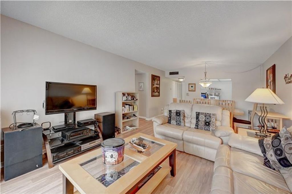 Photo of 4150 NW 90th Avenue #202, Coral Springs, FL 33065 (MLS # B26018918)