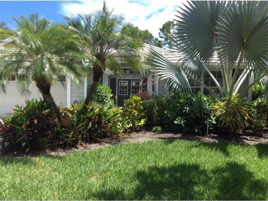 Beautifully maintained 3 BR/2-1/2 BA Key West style pool home in the desirable Arbors community. On tranquil preserve, very private lot w/lush tropical landscaping everywhere! Open plan, 12' ceilings, designer colors & porcelain tile throughout. Spacious living area w/gas stone fireplace overlooks pool. Eat-in kitchen w/gas range & breakfast bar (TV included). Split bedroom plan, master suite w/walk-in closet, 3d BR w/french doors can be den/office. Fully screened lanai, heated pool & covered patio for entertaining. Newer A/C, new washer/dryer, hurricane shutters. Zoned sprinkler on well water. The Arbors is a gated community of 190 homes, low HOA, lined w/oak trees, preserve & lake views. A-rated Martin County schools. One of the most reasonably priced pool homes in the community!