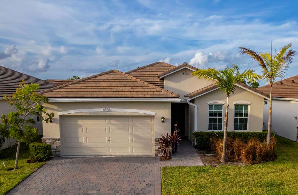 Photo of 4530 NW Exchange Avenue, Jensen Beach, FL 34957 (MLS # B26037512)
