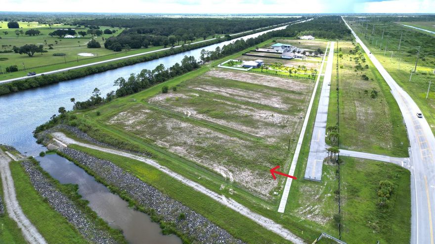 Welcome to Hemingway Estates, Palm City's premier waterfront and equestrian community. This 3+ acre homesite at 9750 SW Hemingway Terrace offers expansive waterfront views on the St. Lucie Waterway with direct access to both the Atlantic Ocean and Gulf of America. The community requires a minimum home size of 3,200 sq. ft. of living area, making it the perfect setting for a custom luxury estate. With room for your own private dock, this lot is ideal for those who enjoy South Florida's boating lifestyle. Hemingway Estates is known for its natural beauty, privacy, and prestige, offering residents the rare combination of waterfront living and equestrian appeal. Conveniently located near top-rated schools, golf, dining, shopping, and with quick access to I-95 and the Turnpike, this is a uniqu