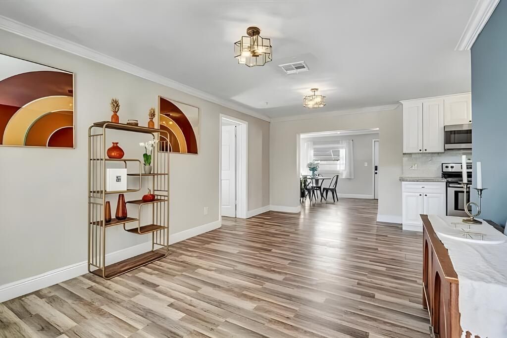 Photo of 6941 Boston Drive, Atlantis, FL 33462 (MLS # B26032443)