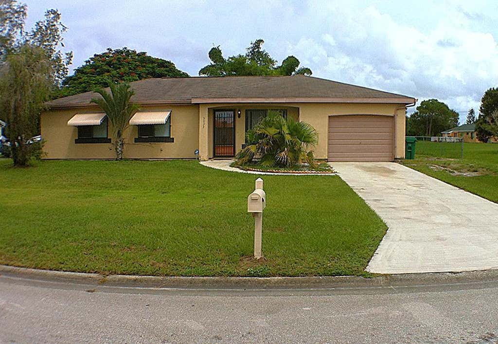 Photo of 3033 SW Denton Street, Port Saint Lucie, FL 34953 (MLS # B26038085)