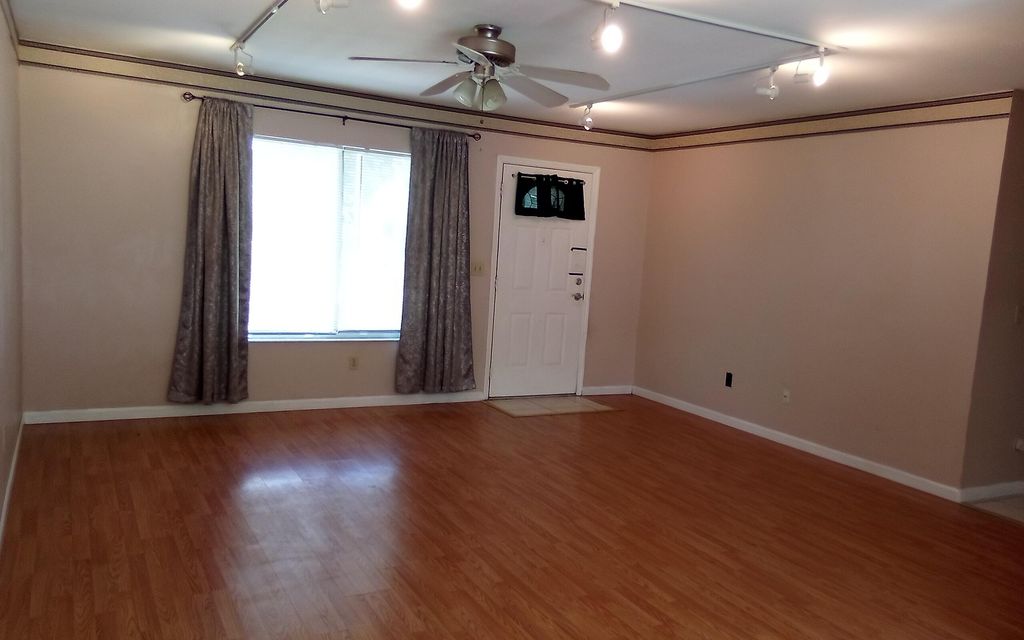 Photo of 3033 SW Denton Street, Port Saint Lucie, FL 34953 (MLS # B26038085)