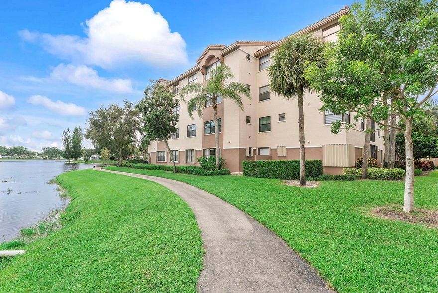 Welcome to this beautifully maintained 3 bedroom, 2 bathroom condo located on the 3rd floor of the highly sought-after Bayport Village. This move-in ready gem offers a spacious split floor plan filled with natural light, soaring vaulted ceilings, and a fresh coat of paint throughout creating a bright and inviting ambiance. The layout includes a dedicated laundry room with full-size washer and dryer hookups for added convenience. Relax on the private screened-in balcony, perfect for enjoying your morning coffee or evening breeze. The master suite features a generous walk-in closet and an en-suite bathroom with a walk-in shower. Tile flooring throughout the home, offering easy maintenance and a clean, modern feel. Enjoy a true resort-style lifestyle with amenities that include a clubhouse,