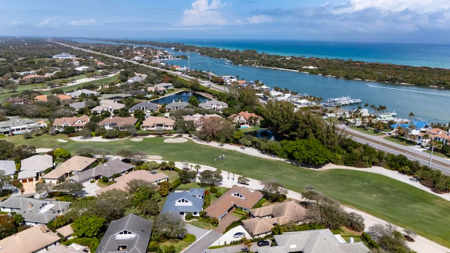Upscale single-story estate located on the 16th hole of prestigious Jupiter Hills with sweeping fairway views. Fully renovated to the studs in 2015 by Ed Knight Contracting, this meticulously maintained residence offers exceptional quality and craftsmanship throughout. Featuring 3 spacious bedroom suites & 3.5 baths, the home is designed for comfort and privacy. The chef's kitchen by Waterview Kitchens includes custom cabinetry, premium finishes, high-end appliances, and a large center island, all opening to expansive living and dining areas ideal for entertaining. Designer interiors by Patrick Day Interiors showcase wood flooring, marble accents, soaring ceilings, and abundant natural light. Large windows frame beautiful golf course views. Seamless indoor-outdoor living enhances the home's appeal, offering inviting spaces for both relaxation and entertaining. Move-in ready and impeccably cared for, this property presents a rare opportunity within one of South Florida's most sought-after private golf communities. Golf membership is separate and does not convey with sale. Close to world class shopping and boating! Call now for a private showing!