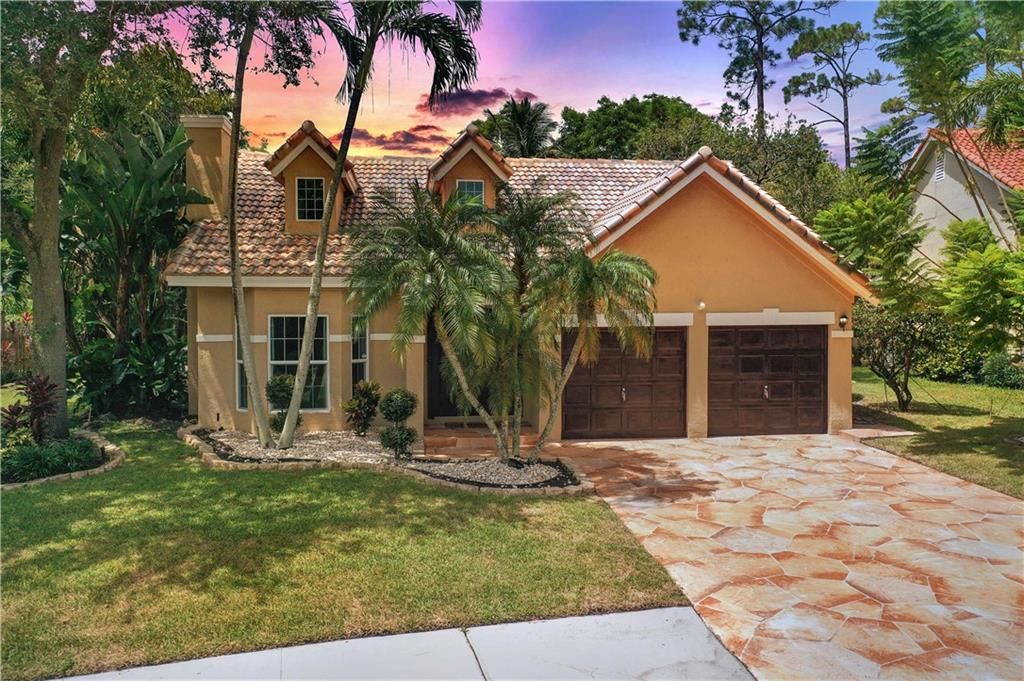 Photo of 5951 NW 65th Ct, Parkland, FL 33067 (MLS # F10299526)