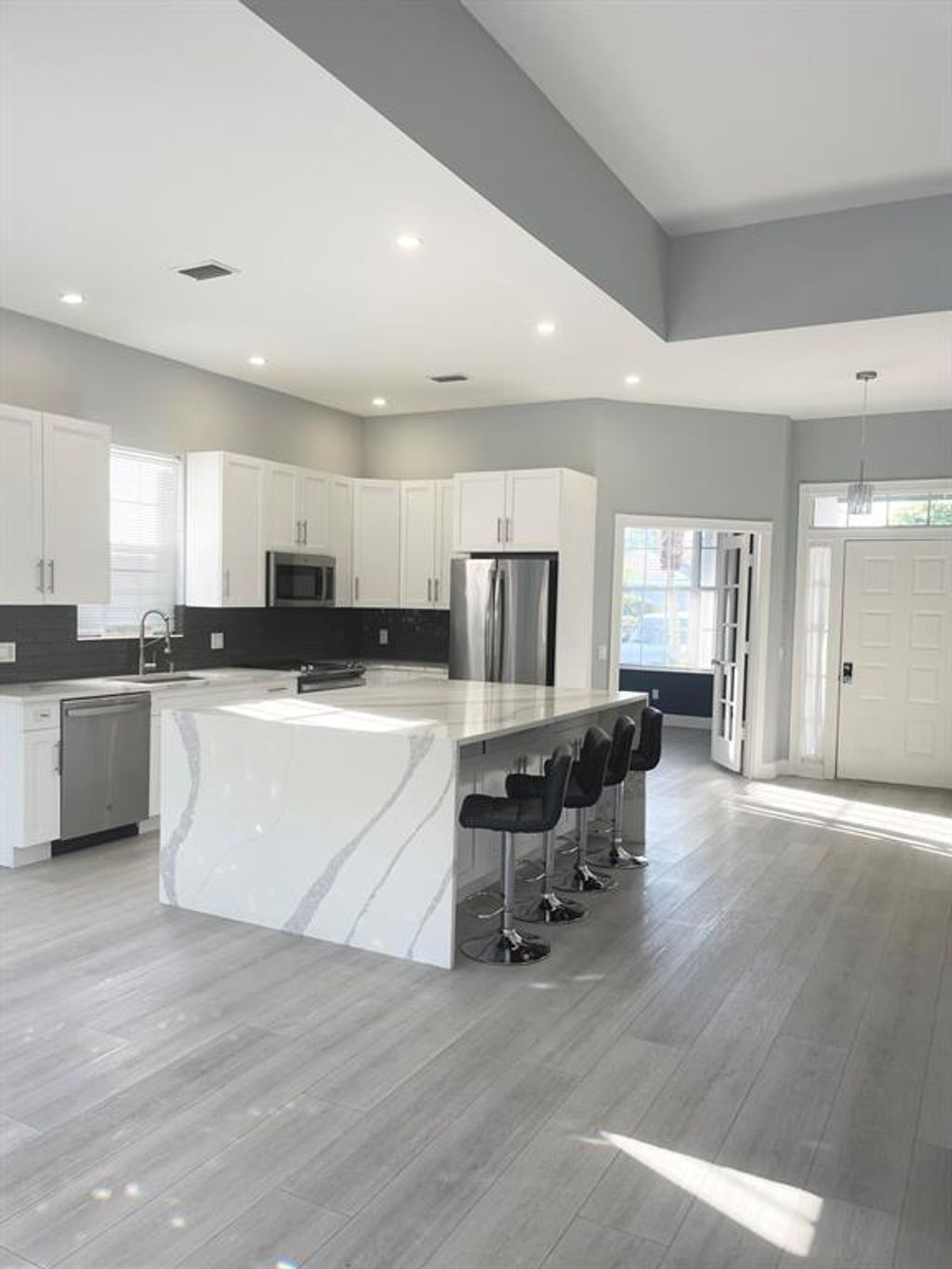 Photo of 304 NW Bentley Circle, Port Saint Lucie, FL 34986 (MLS # R11121732)